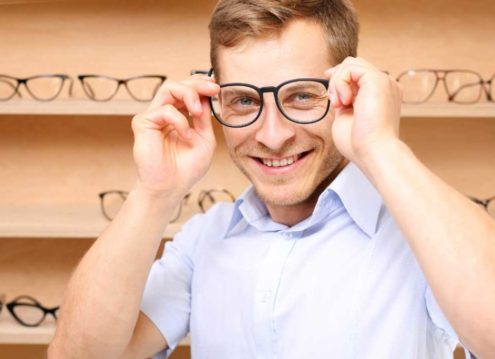 Happy customer wearing stylish glasses