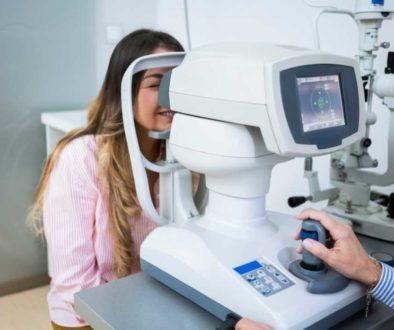 Optometrists performing eye exams on patients in a clinic