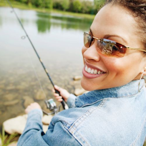 A pair of high-performance fishing glasses with polarized lenses for clear underwater vision.